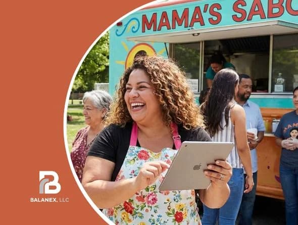 Food truck owner using bookkeeping software to manage finances and track profits